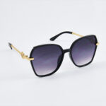 Elegant Eclipse – Zwarte ronde zonnebril met gouden accenten