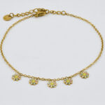 Gouden enkelband met speelse bedels