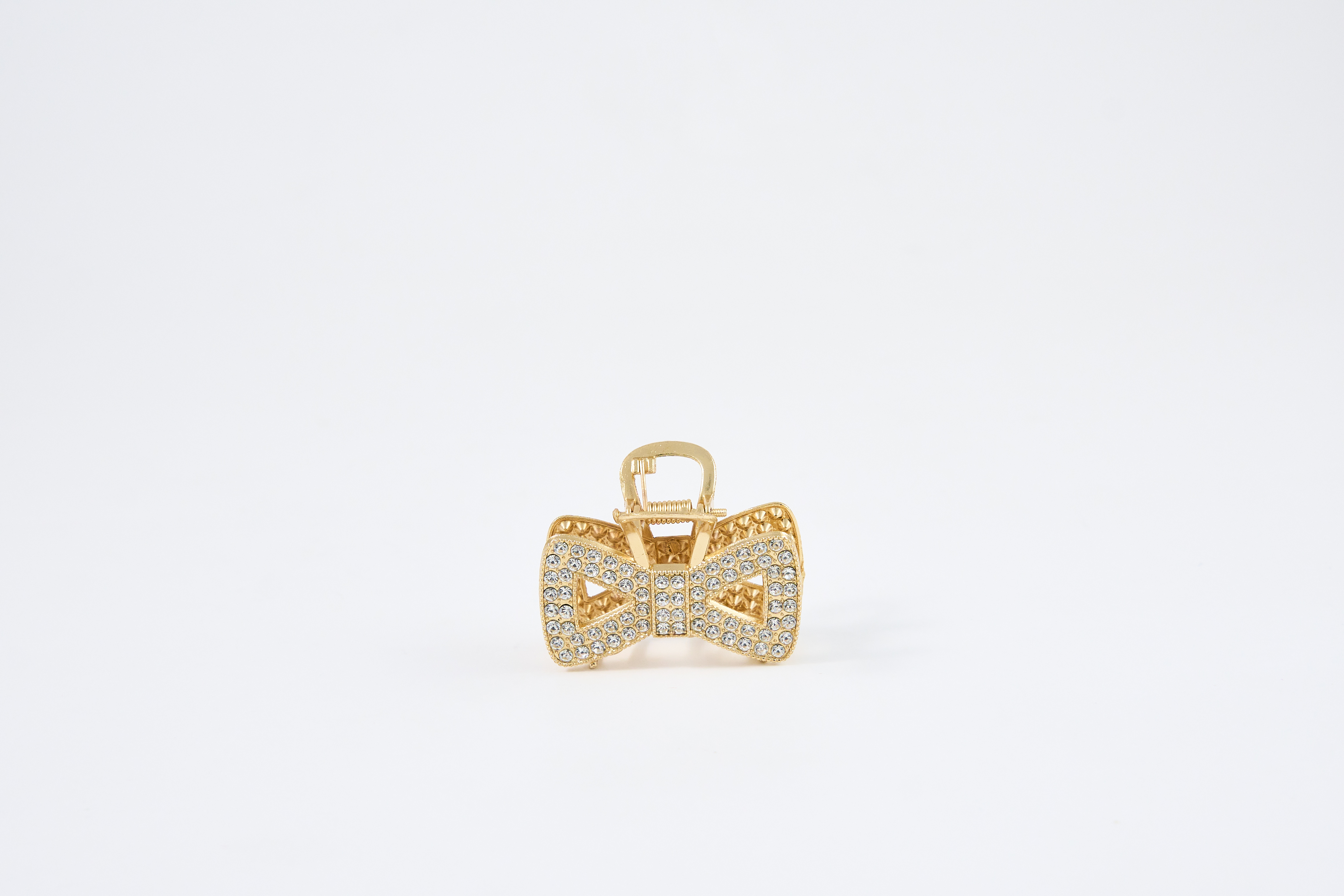 Gouden haarclip met strikdetail