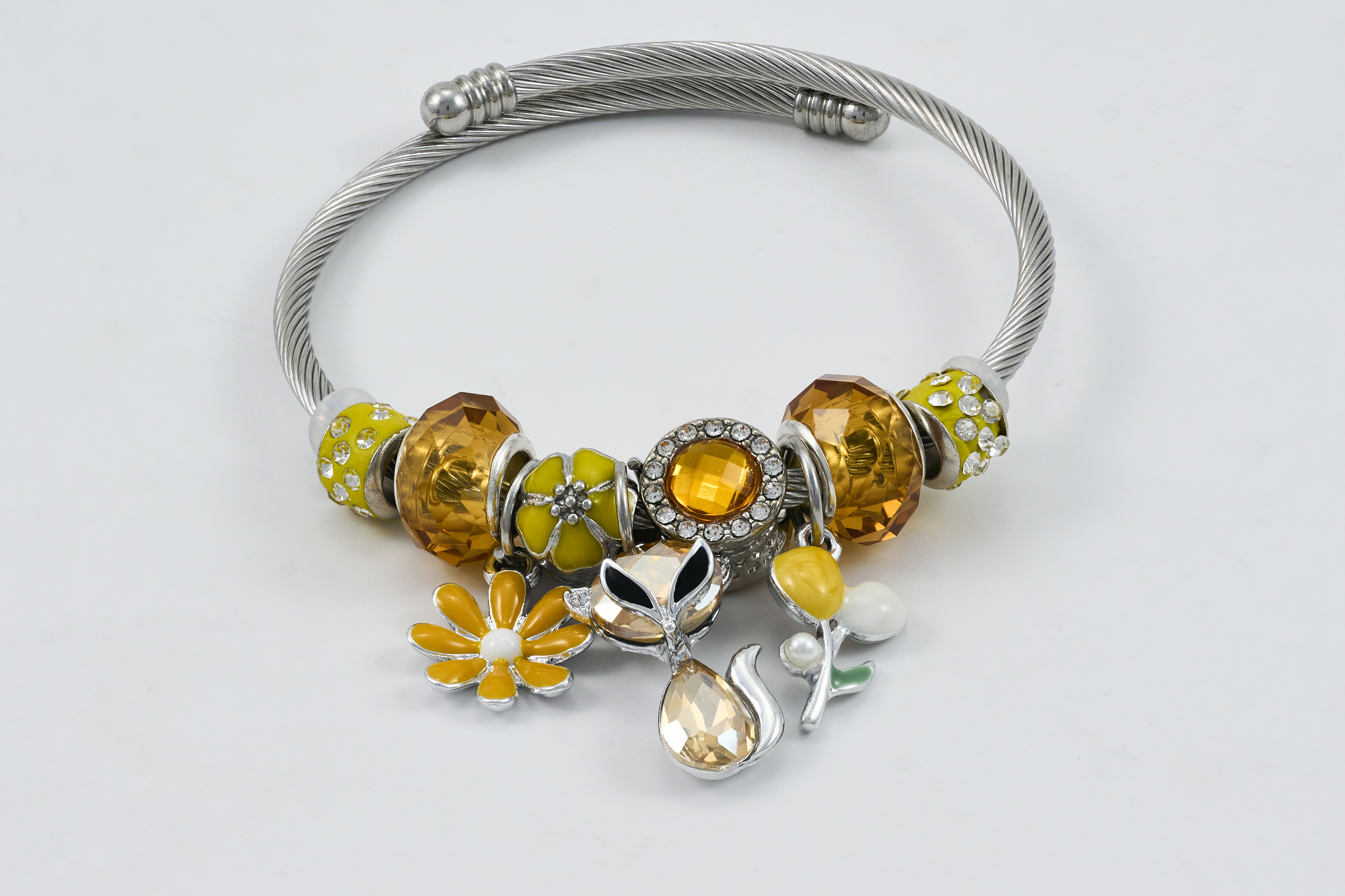 Zilveren armband met oranje en sprankelende steentjes