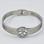 Zilveren armband met ronde symbolen en uitsnijdingen